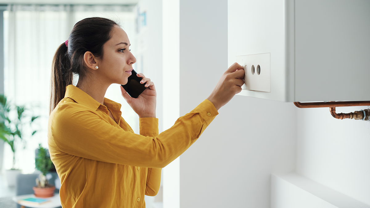 Lady on the phone about her central heating